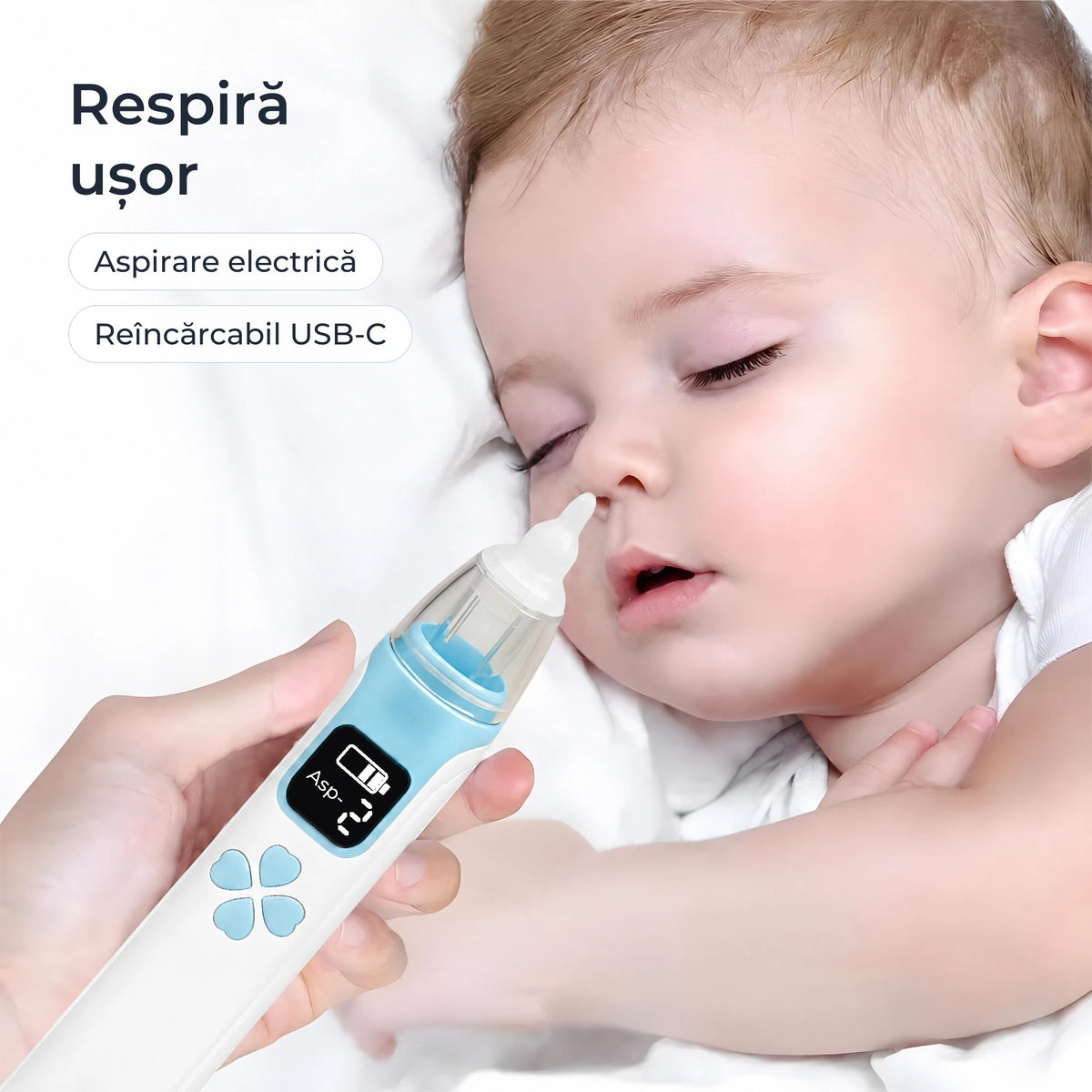 Aspirator nazal electric ținut lângă un bebeluș care doarme 