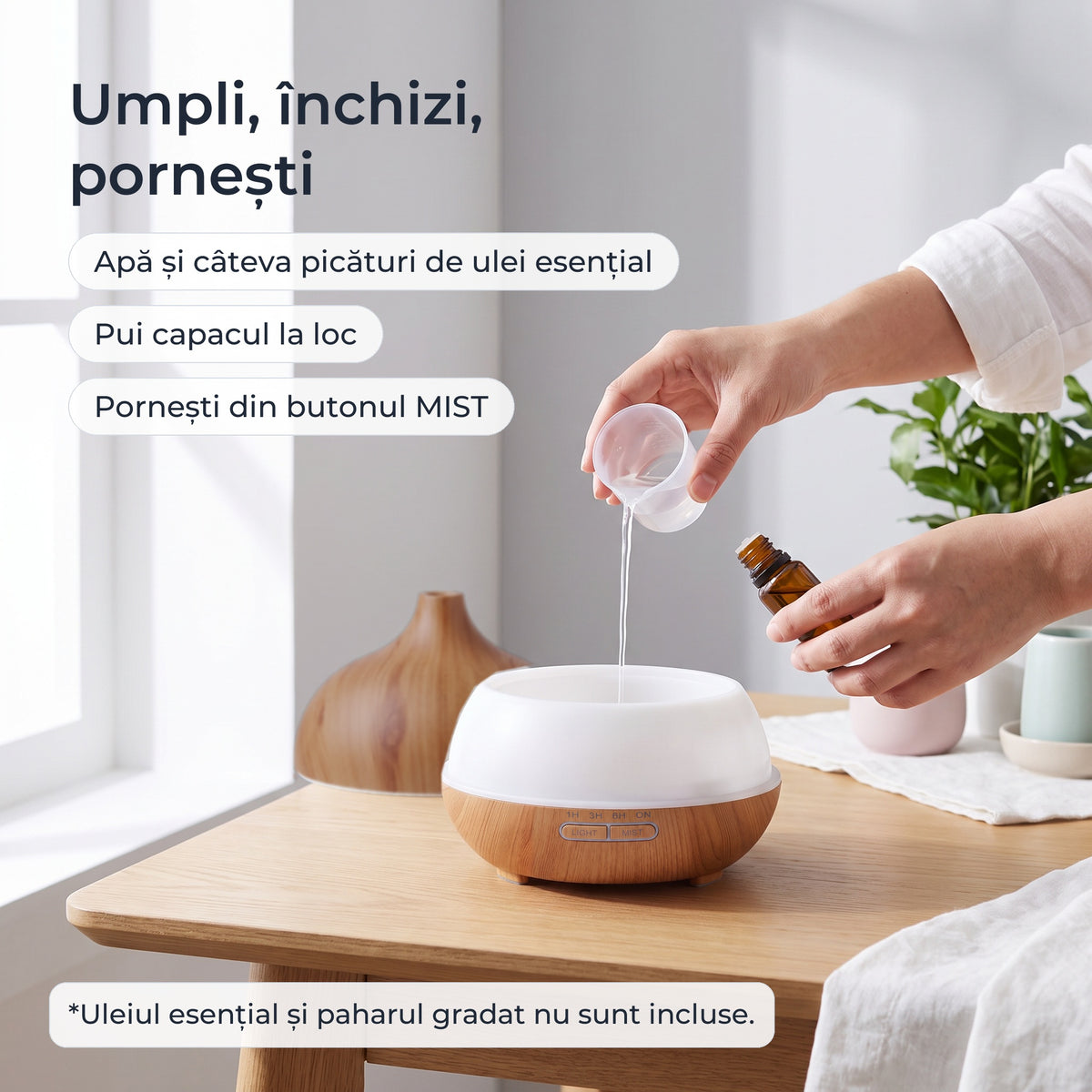 Umplerea rezervorului cu apă și câteva picături de ulei esențial
